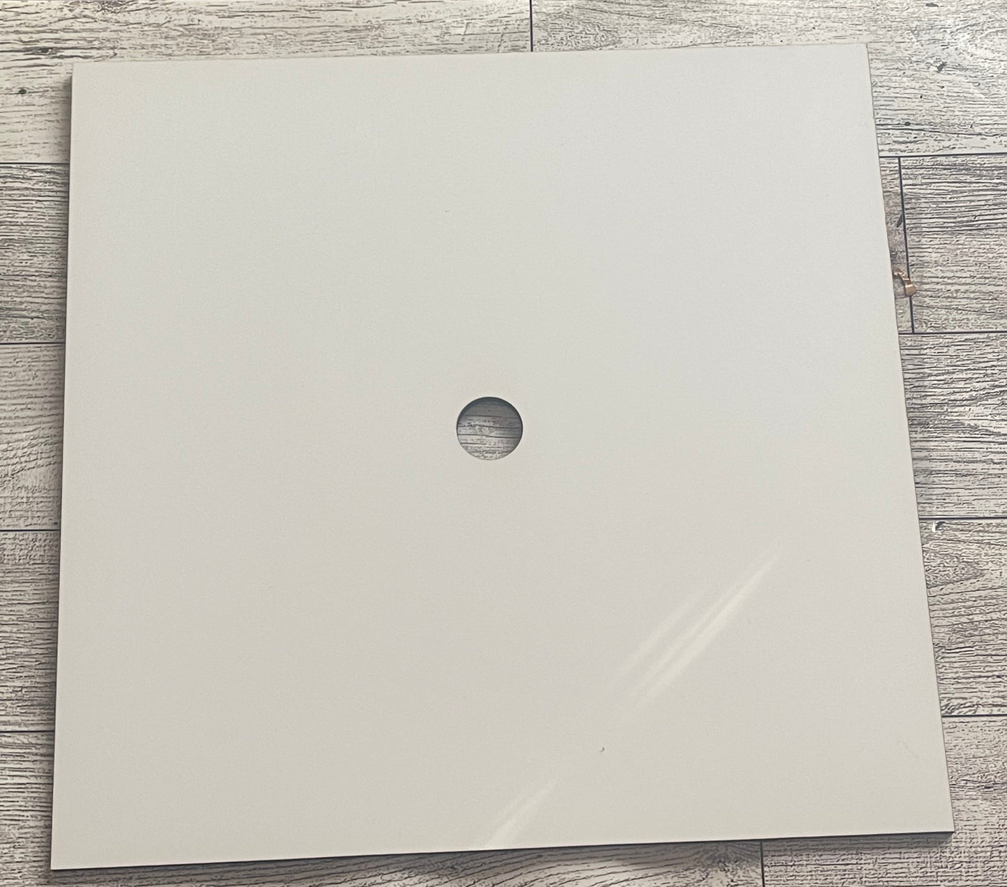 Blank Sublimation Grad Cap Topper on a wooden surface