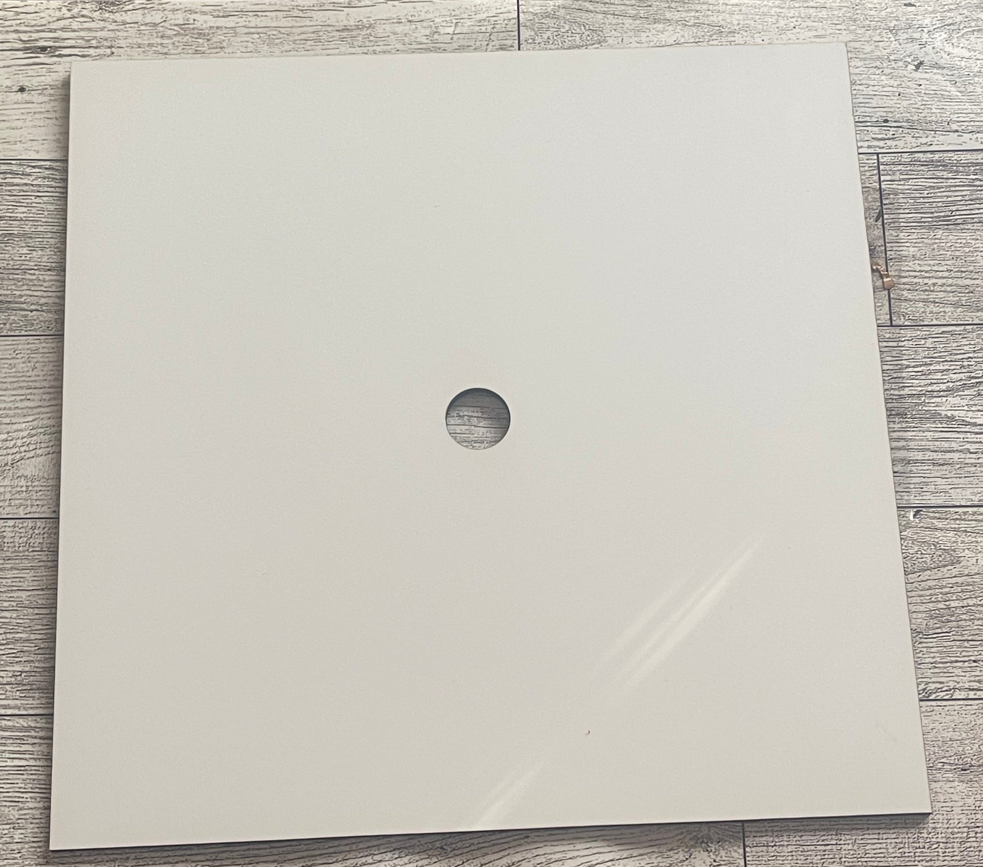 Blank Sublimation Grad Cap Topper on a wooden surface